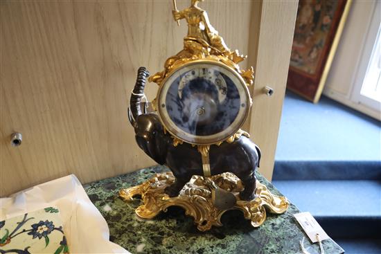 A late 19th century French bronze and ormolu mantel clock, height 17in.